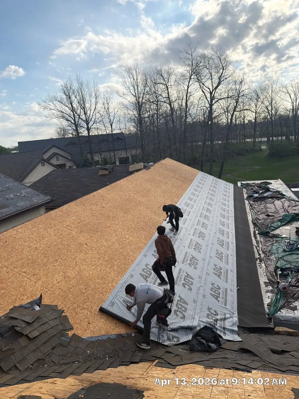 Tarping and dry-in on a Yorktown commercial roof